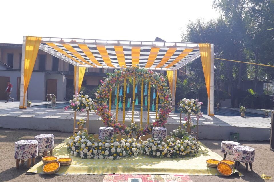 Floral haldi ceremony decor at Jim Corbett destination wedding resort