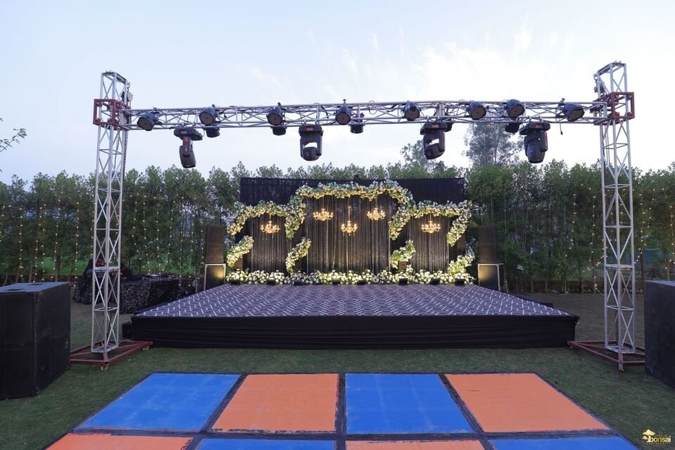 Sangeet night stage with lighting truss at Jim Corbett destination wedding