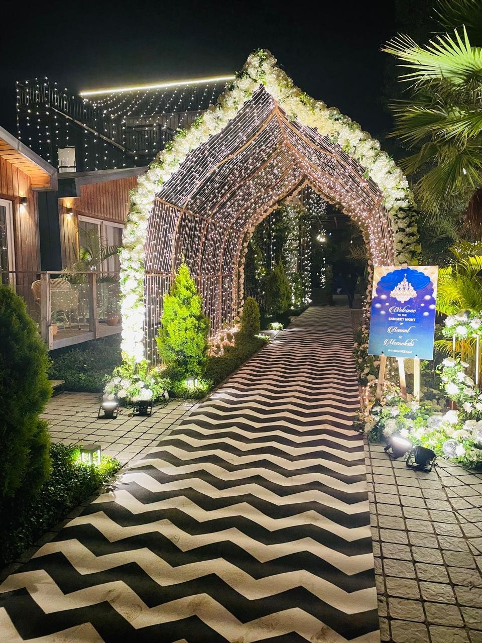 Decorated event venue with wedding arrangements